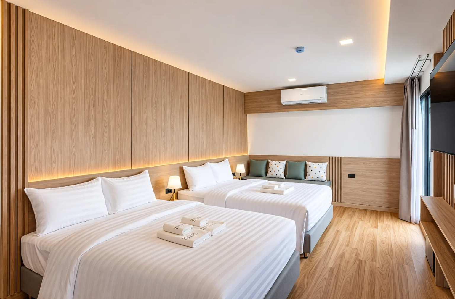 ห้องแฟมิลี่ของ Solyn Hotel พร้อมเตียงควีนไซส์ 2 เตียง